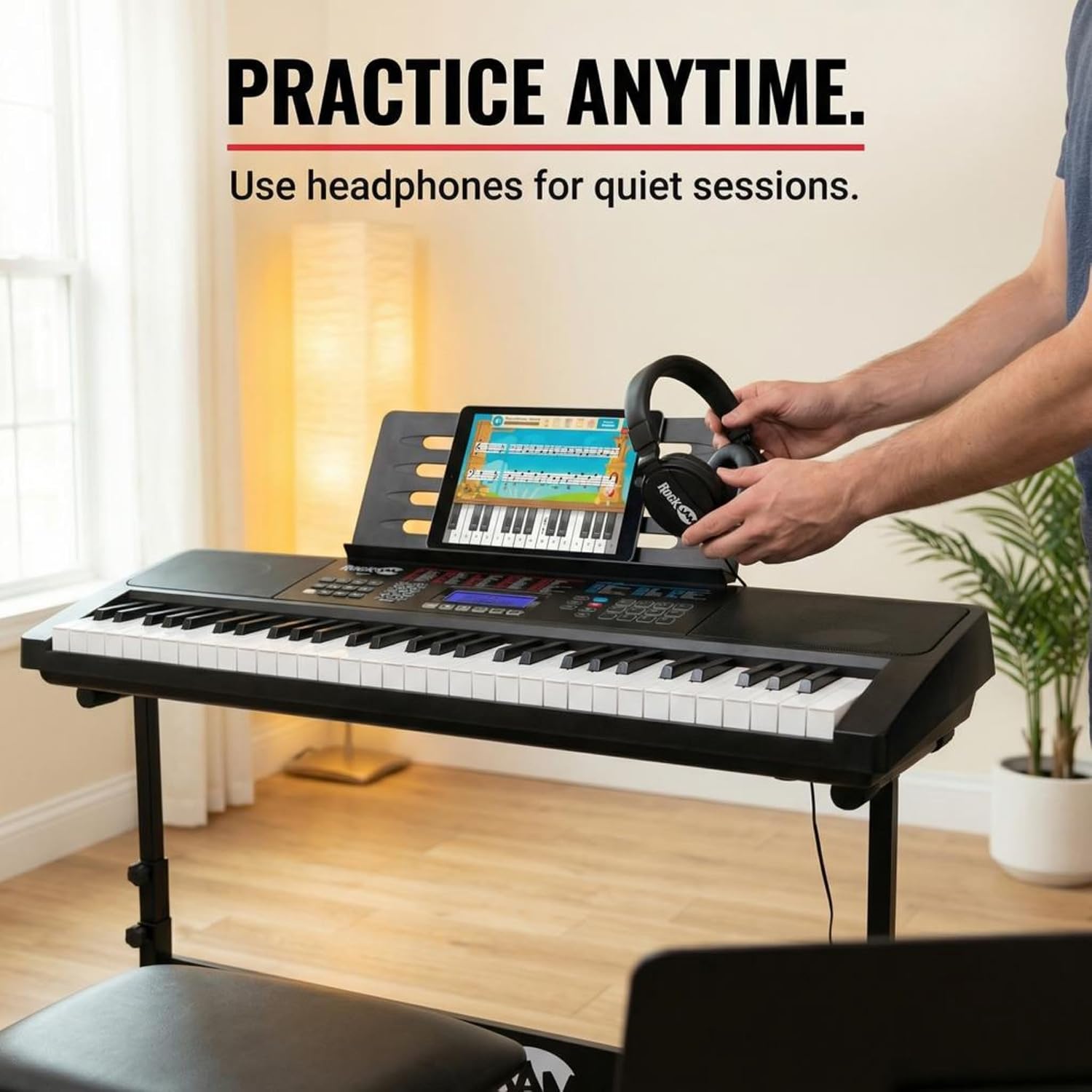 RockJam RJ761 keyboard being used with headphones for quiet practice