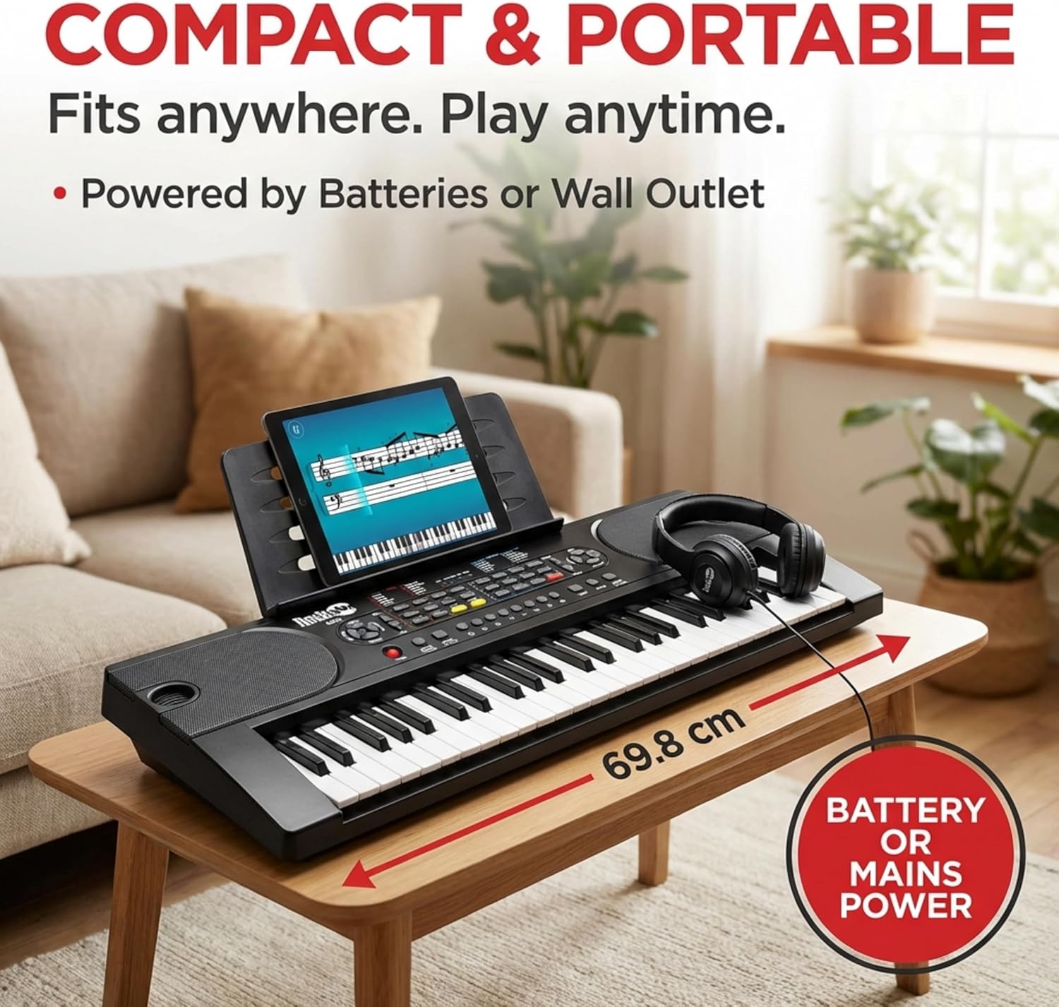 RockJam RJ549 compact 49-key keyboard on a table with battery or mains power