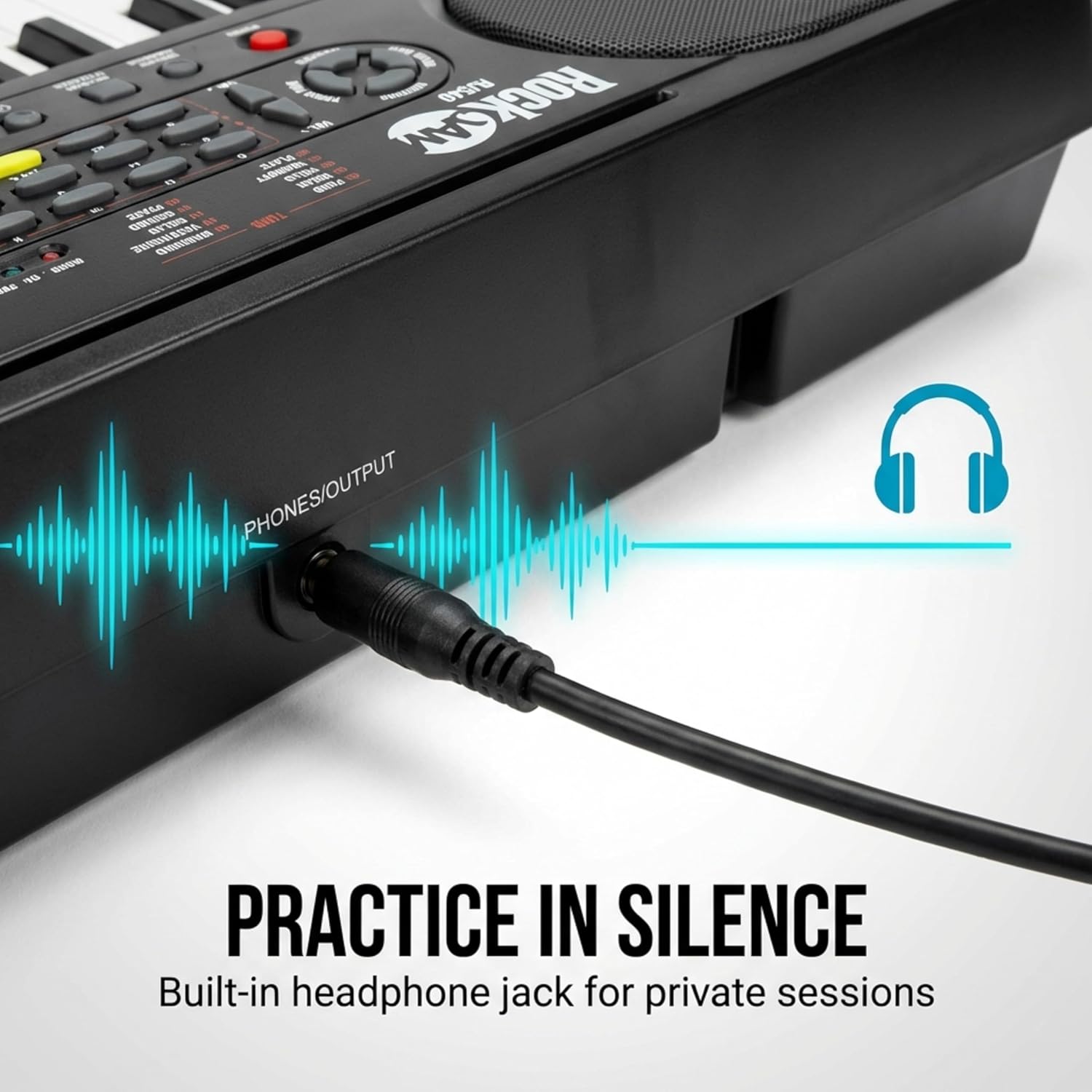 Headphones connected to RockJam RJ549 keyboard for quiet practice